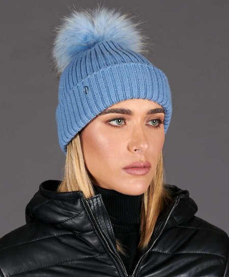 Light blue beanie hat with light blue fur pompom