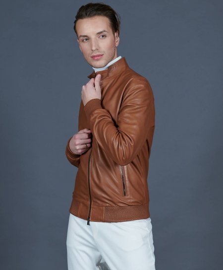 Bomber jacket in tan leather with canne embroidery 