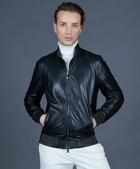 Bomber jacket in black leather with canne embroidery 