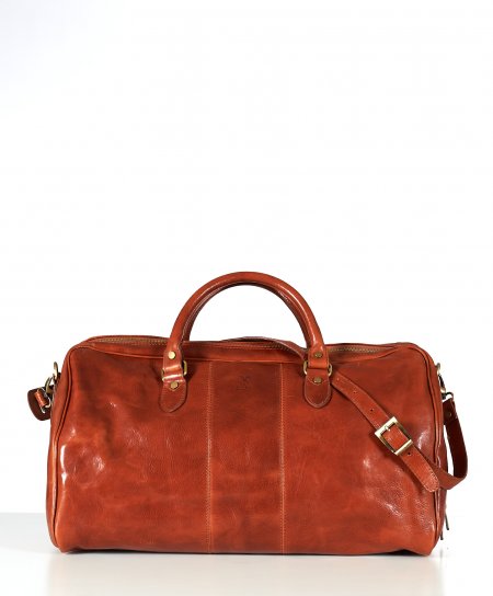 Tan leather travel bag with folding handle